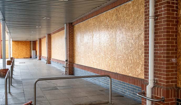 Boarded-up fire damaged commercial property