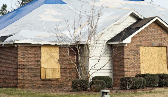 Boarded up house