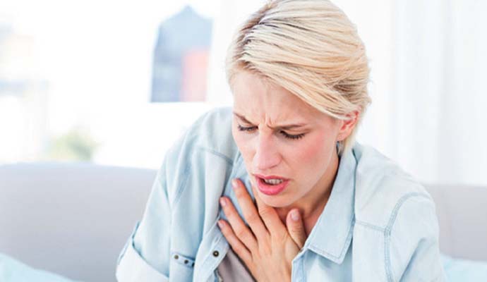 Woman having breathing problem Woman having breathing problem