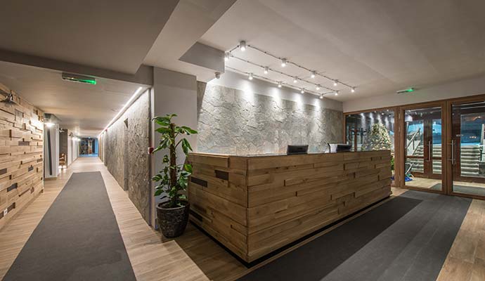 Reception desk and hallway of a modern hotel lobby