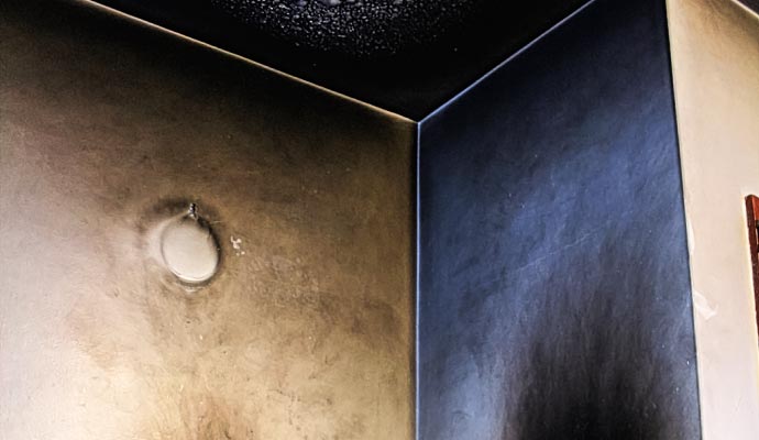 Smoke & soot damaged wall