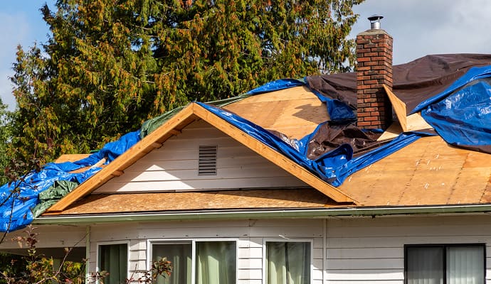 Improper tarping over roof