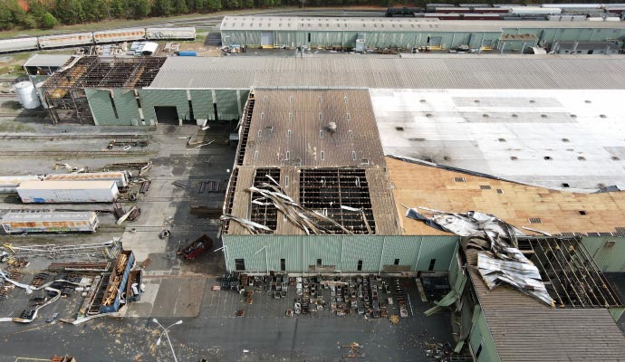 Storm damage restoration service for commercial space