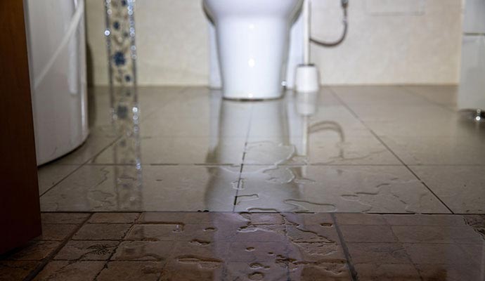 Wet toilet floor